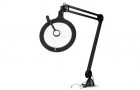 Magnifying lamps with articulated arm